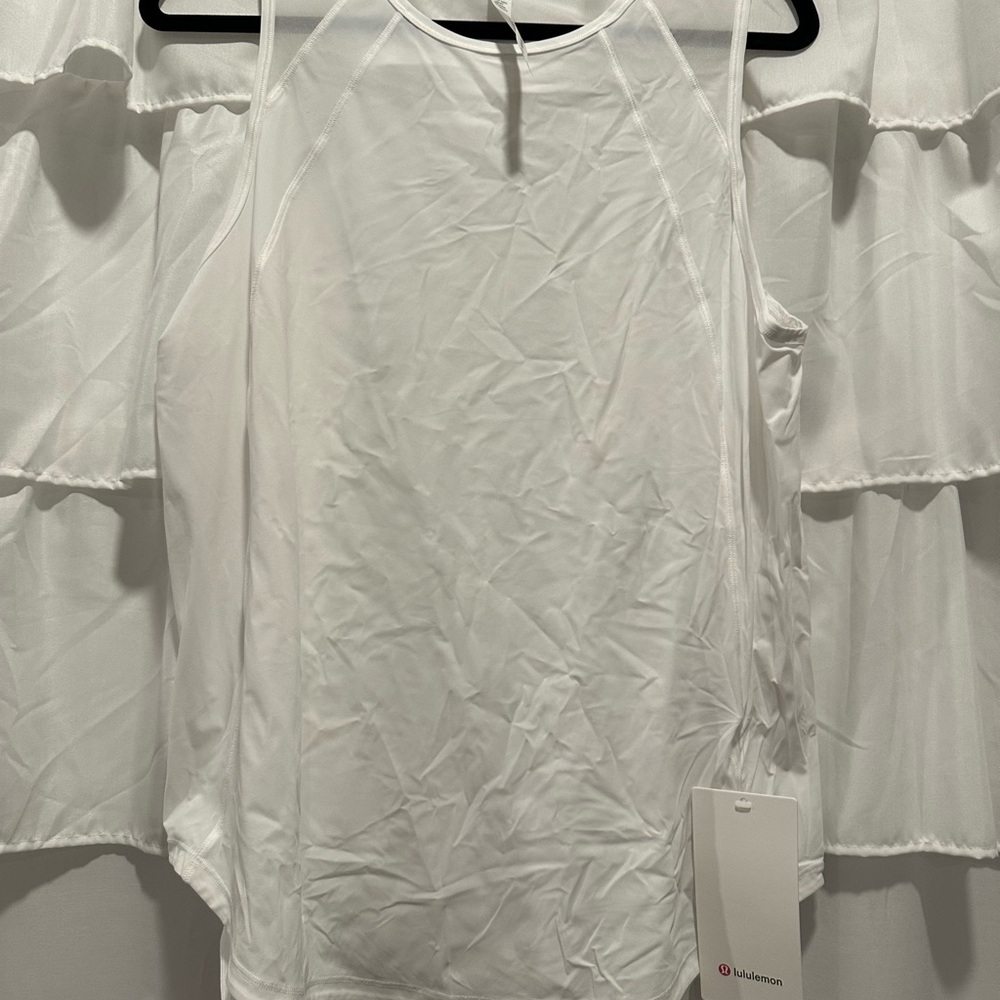 White Sleeveless Top